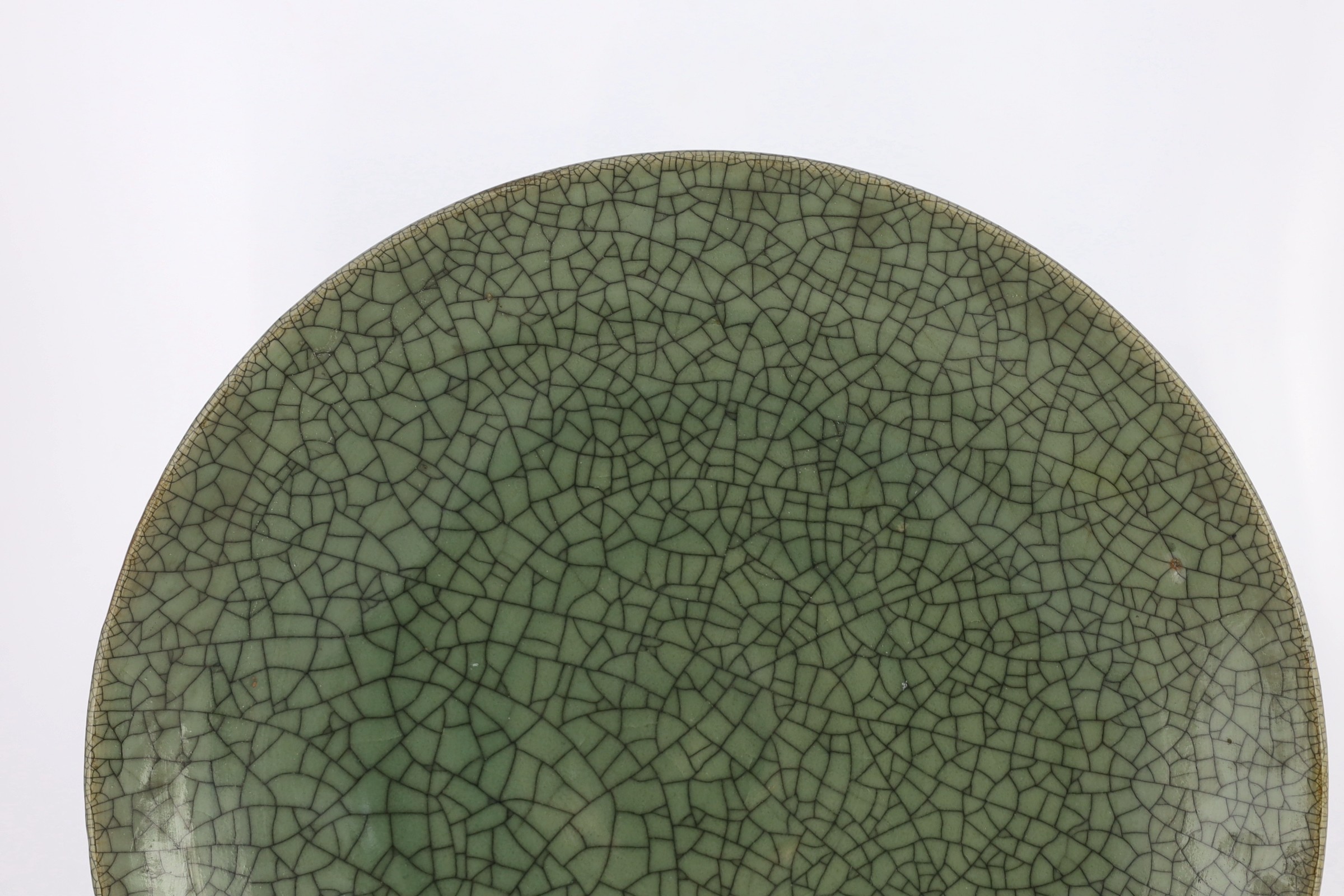 A large Chinese Guan type crackle glaze dish, 19th/20th century, 45.5cm diameter